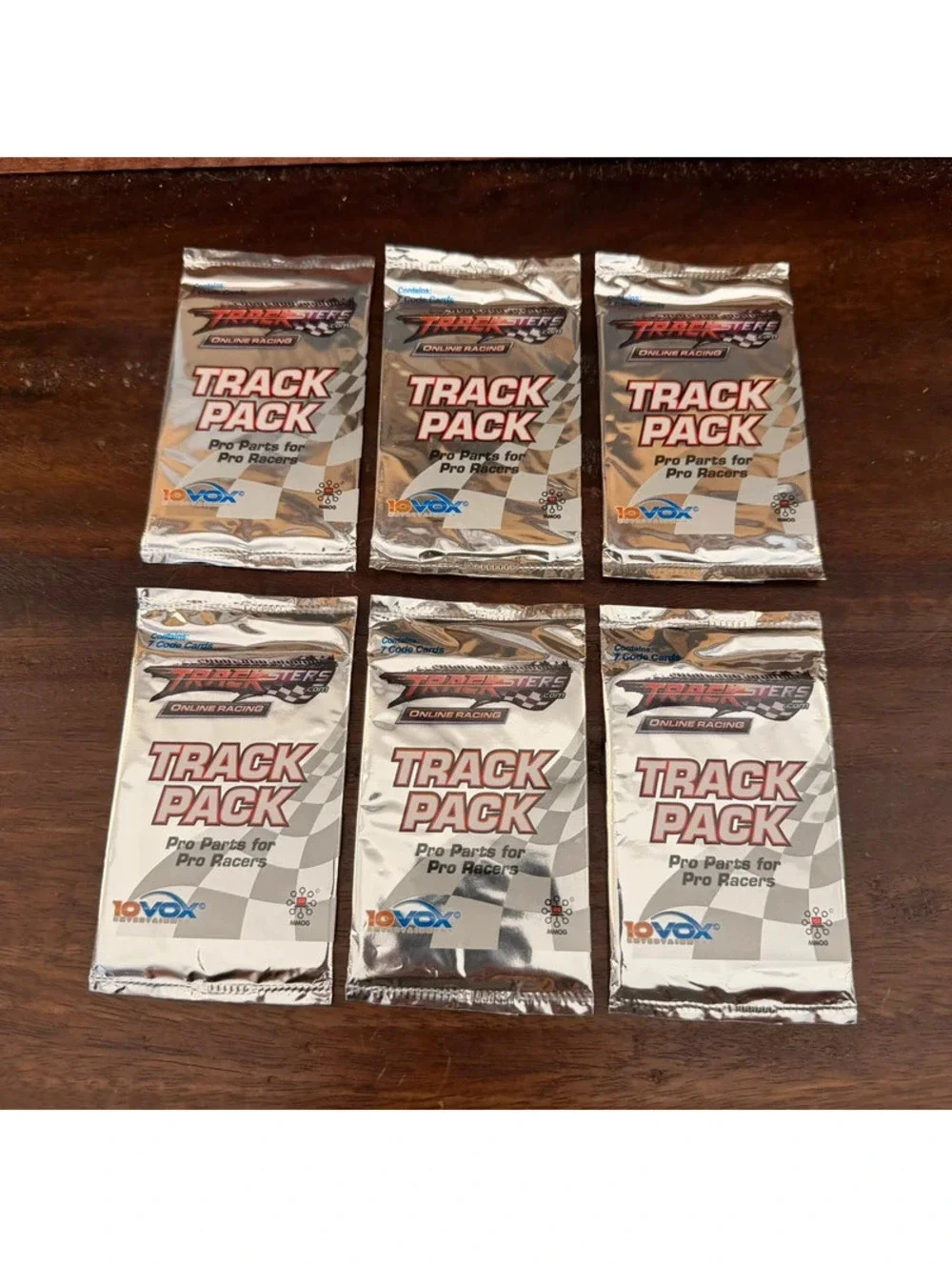 Lot of 6 Sealed Tracksters Online Racing 